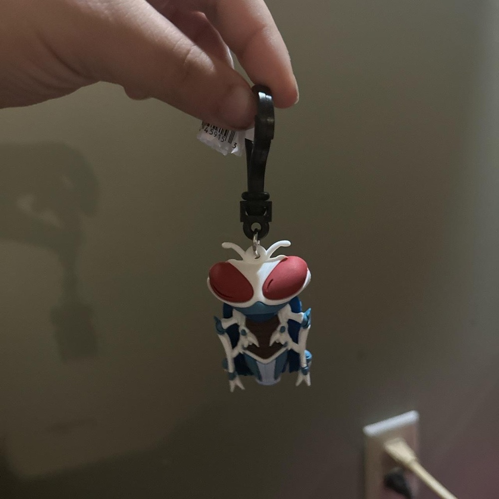 dc peacemaker exclusive key chain
